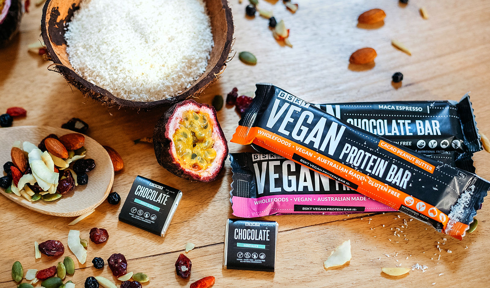 An image of protein bars, passionfruit and coconut