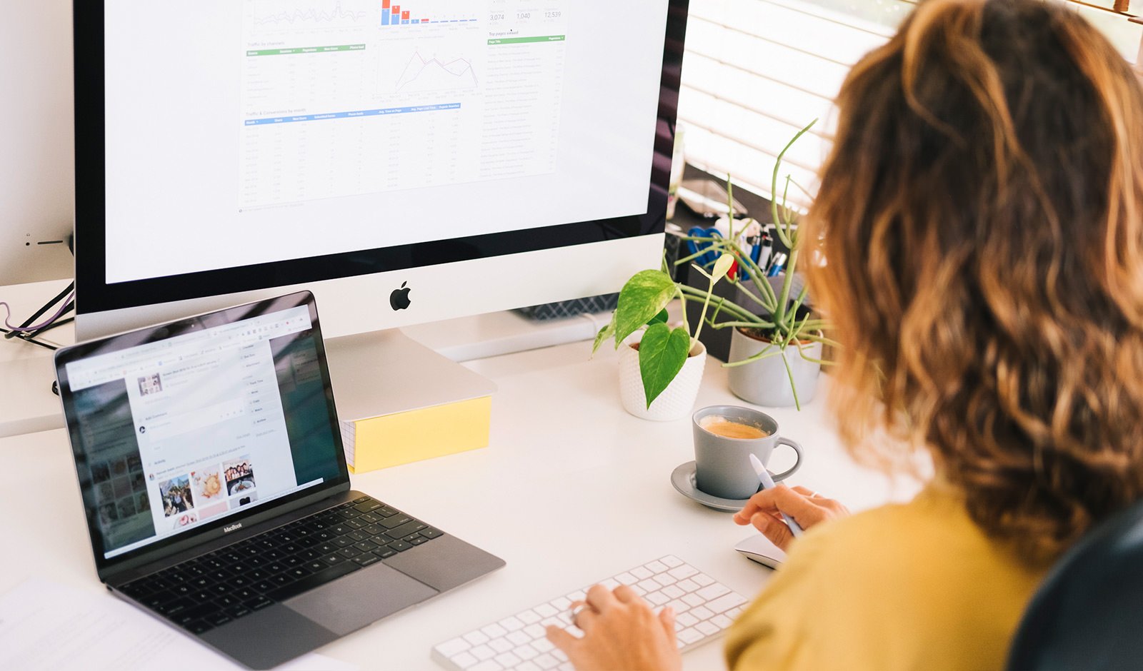 A woman analysing data from a marketing campaign