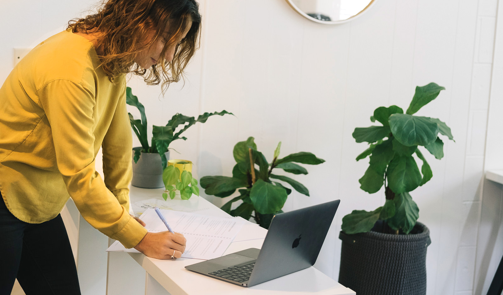 A woman proofing a marketing strategy document