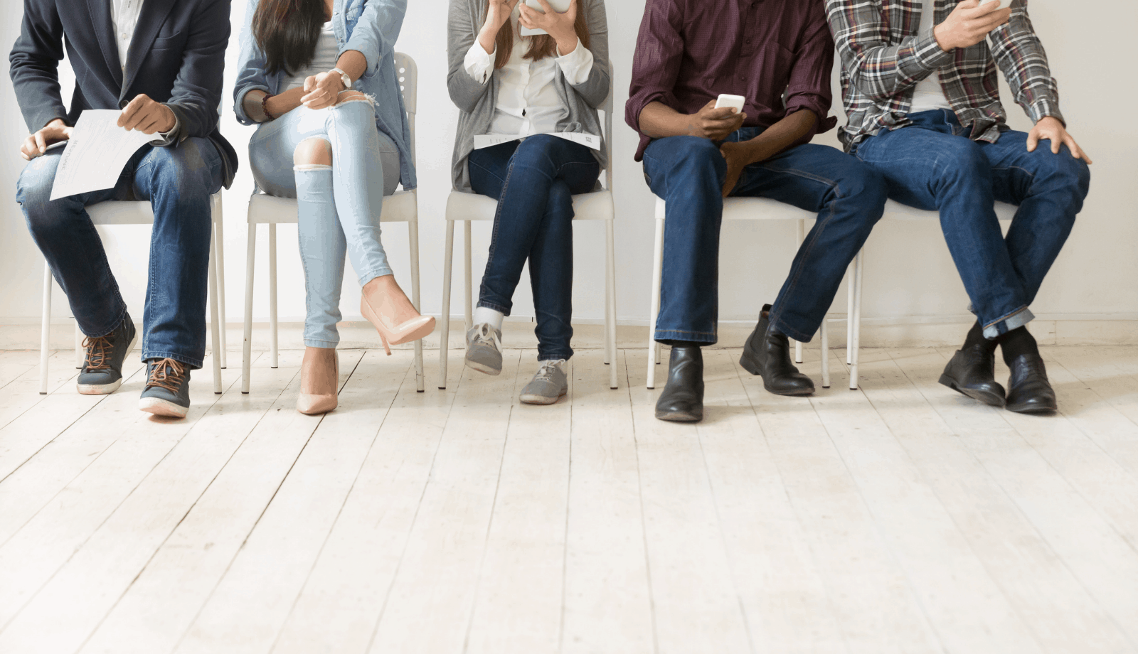 How to do customer research like a pro. Below the neck image of five people sitting in a focus group.