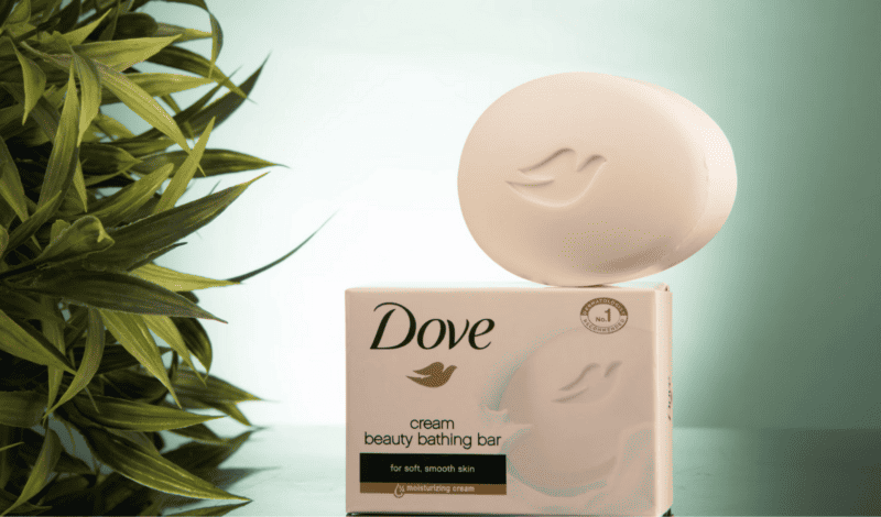 Dove Soap as an example of a brand with purpose pictured next to a plant