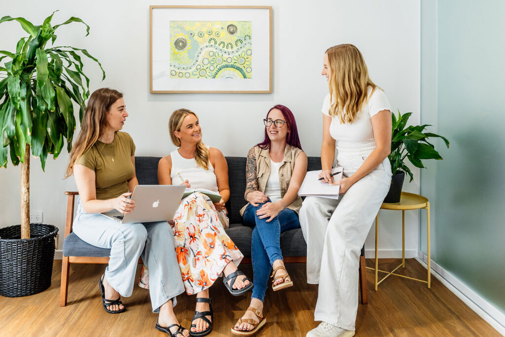 Our creative team having a discussion on the couch
