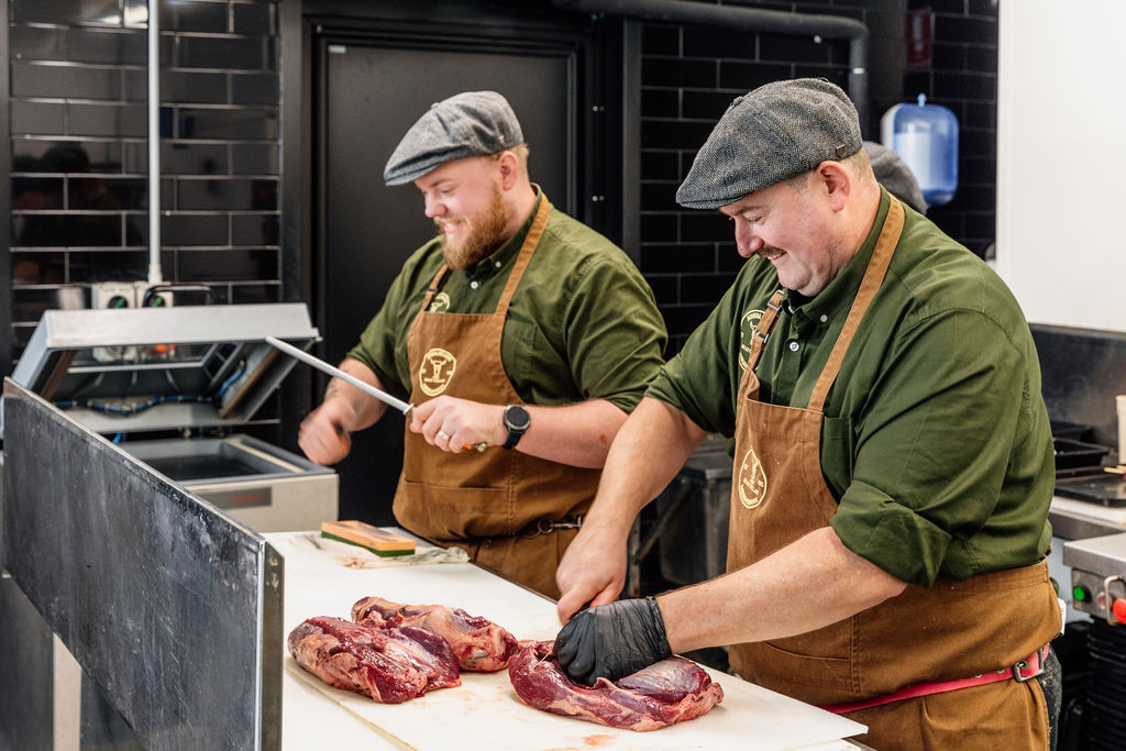 Bermuda Butchers preparing meat